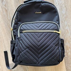 Black Quilted Backpack with Gold Accents